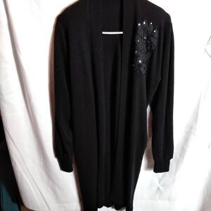 Long sweater with applique and beading